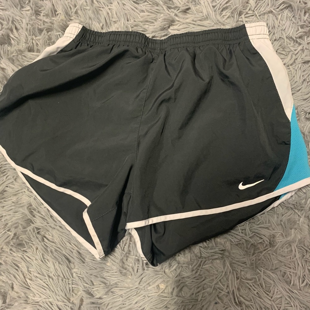 Blue, white, and grey Nike shorts